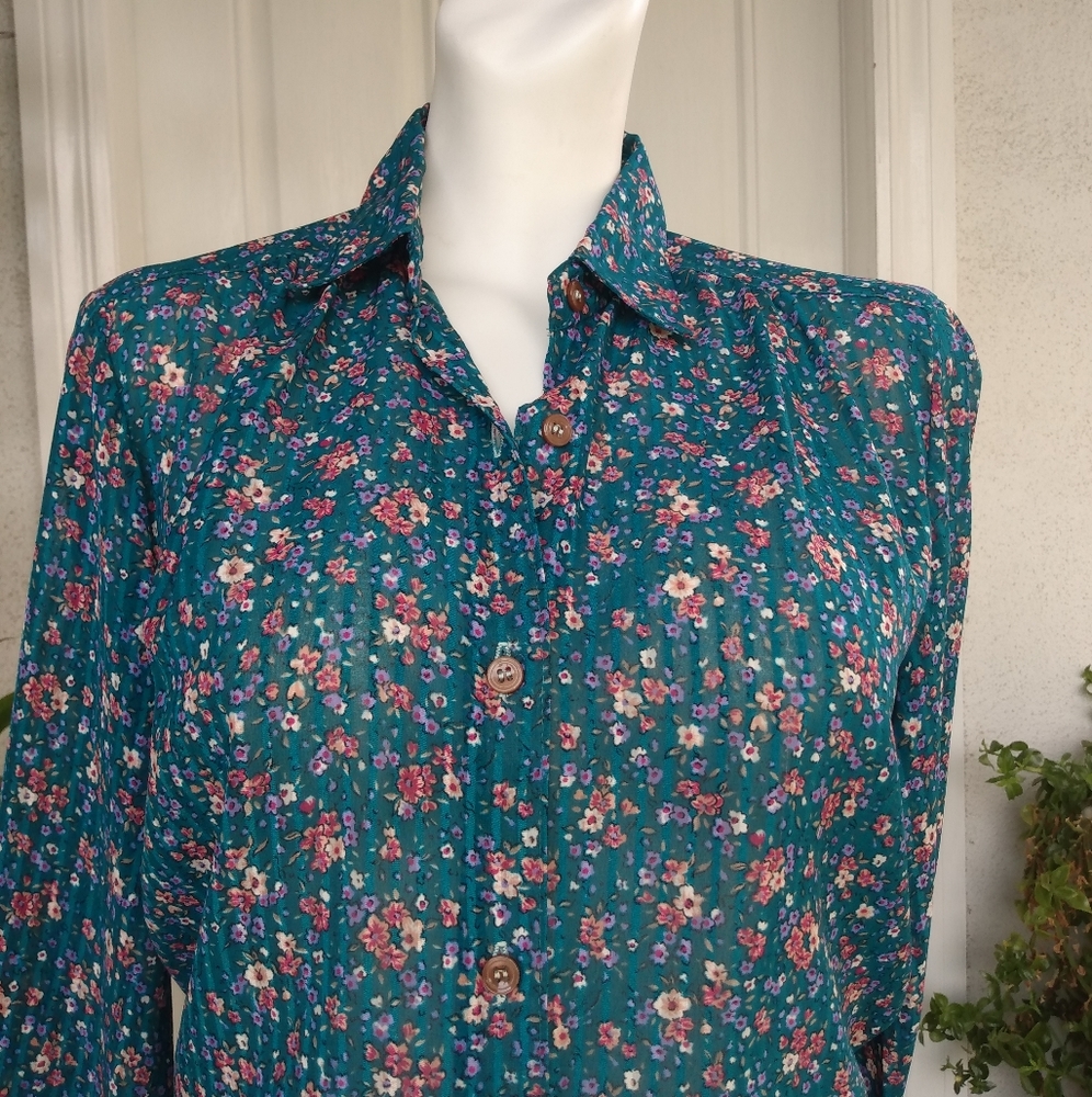 Teal blue blouse with flower